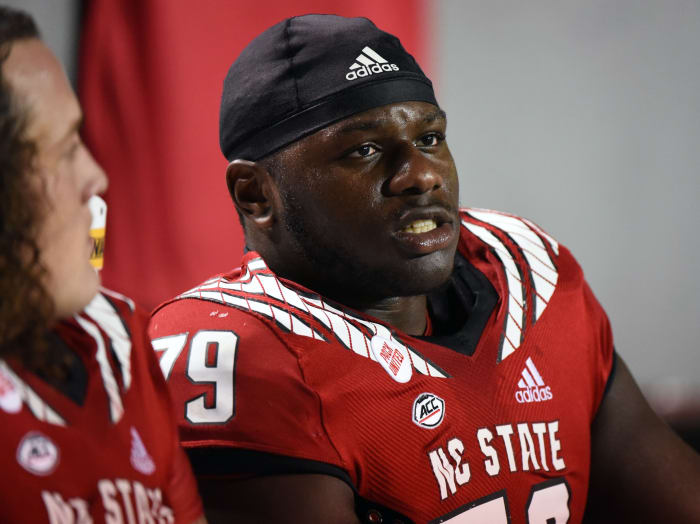NC State OT Ikem Ekwonu sits on sideline